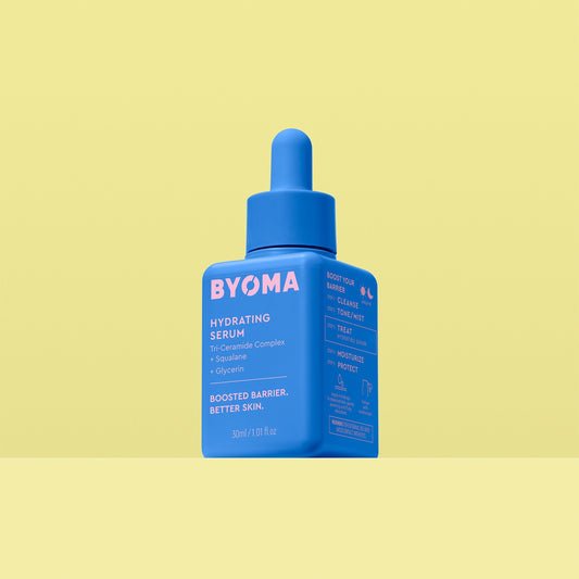 A BYOMA Hydrating Serum bottle in vibrant blue.