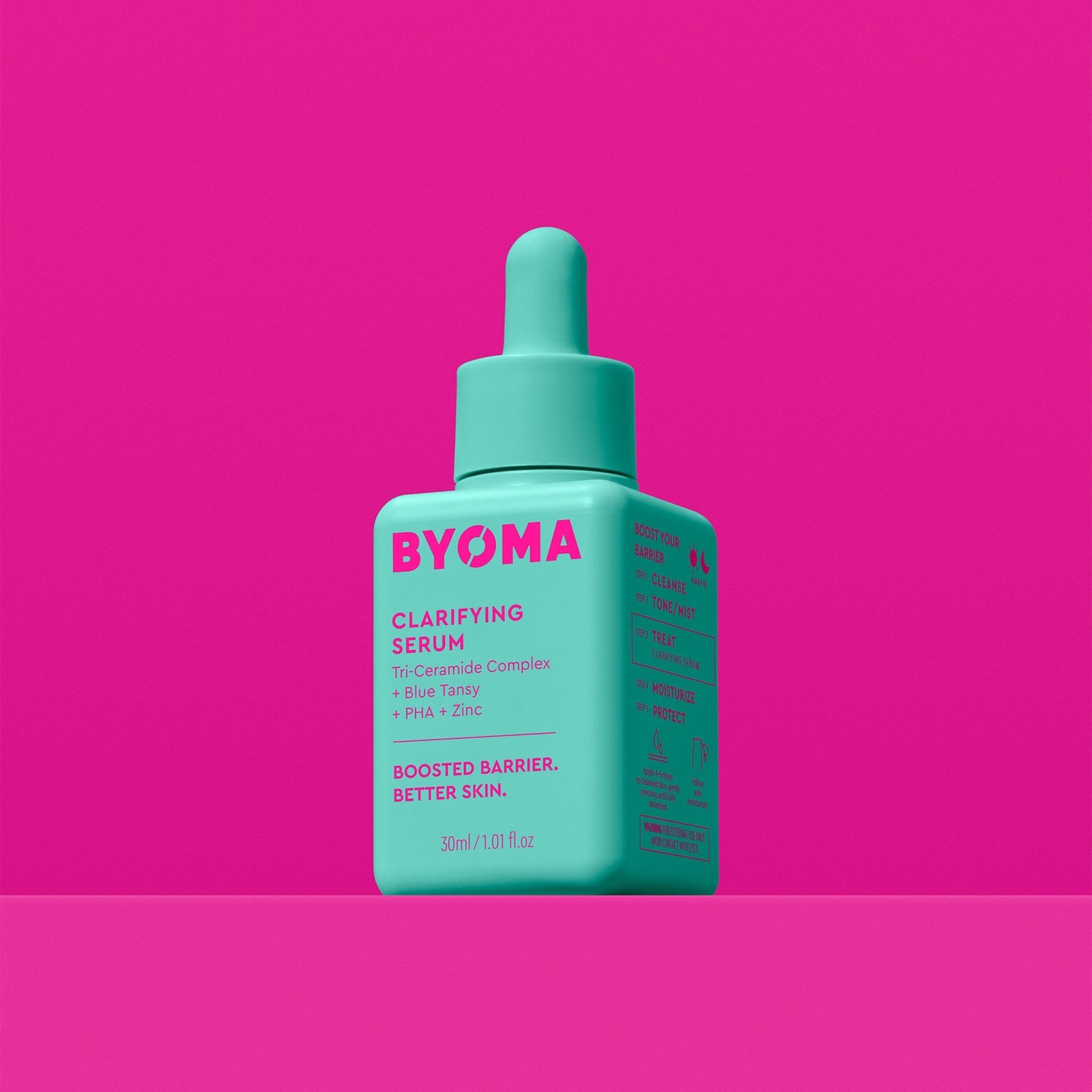 A BYOMA Clarifying Serum in a teal bottle with a dropper cap. 