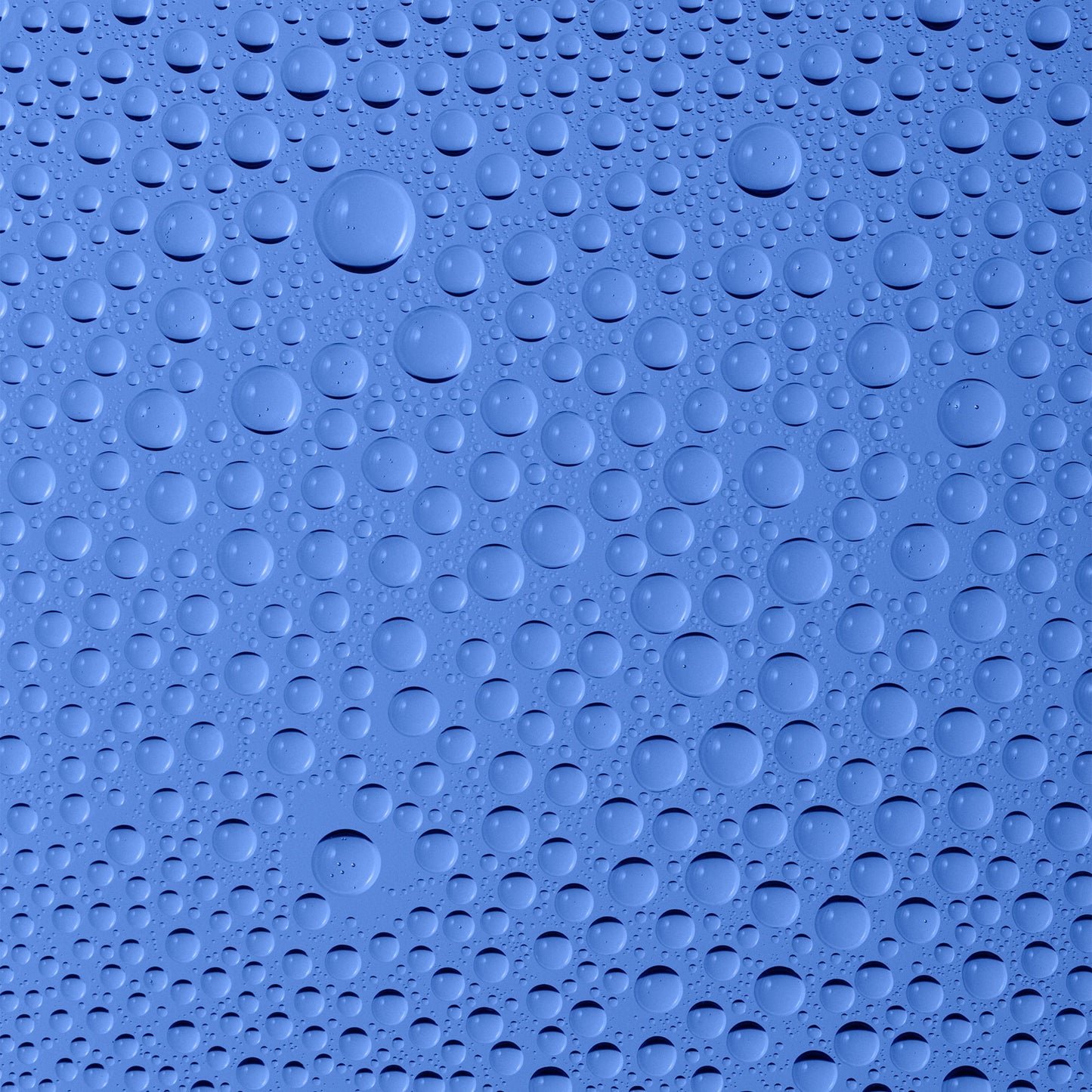 Water droplets on a smooth blue surface.
