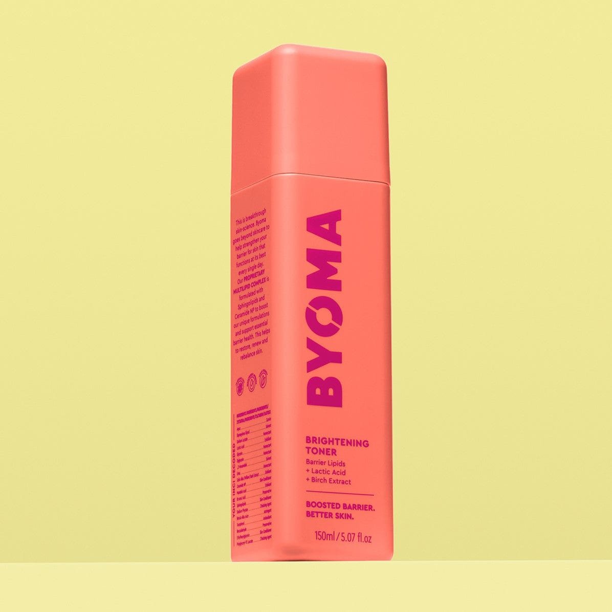 A BYOMA Brightening Toner bottle in a vibrant coral color. 