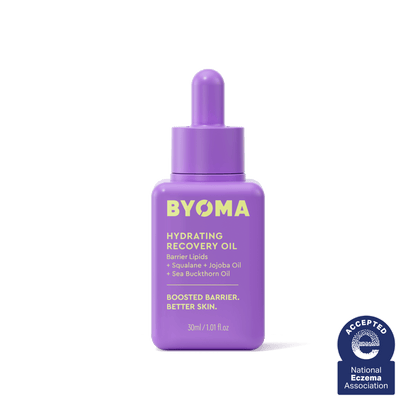 A BYOMA Hydrating Recovery Oil bottle in purple with National Eczema Association seal.