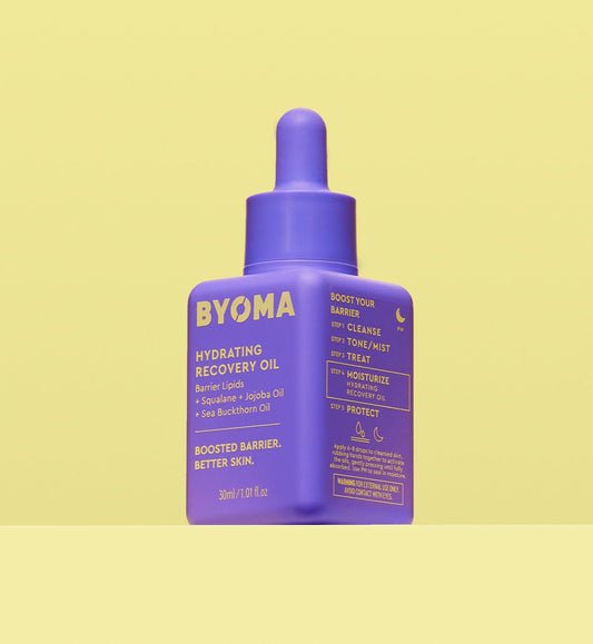 BYOMA Hydrating Recovery Oil in a bold purple bottle. 