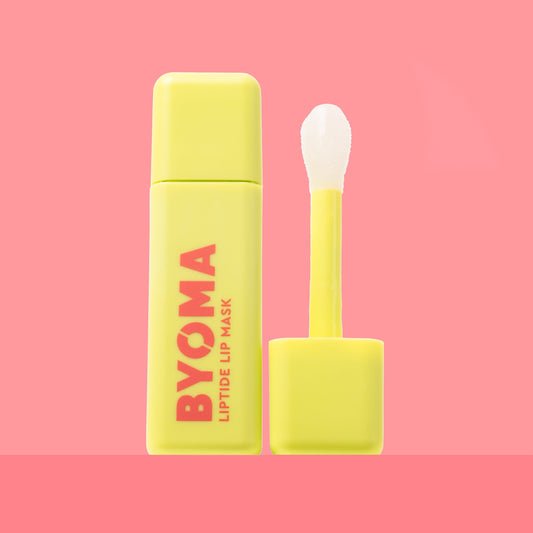 BYOMA Liptide Lip Mask in a vibrant yellow bottle. 