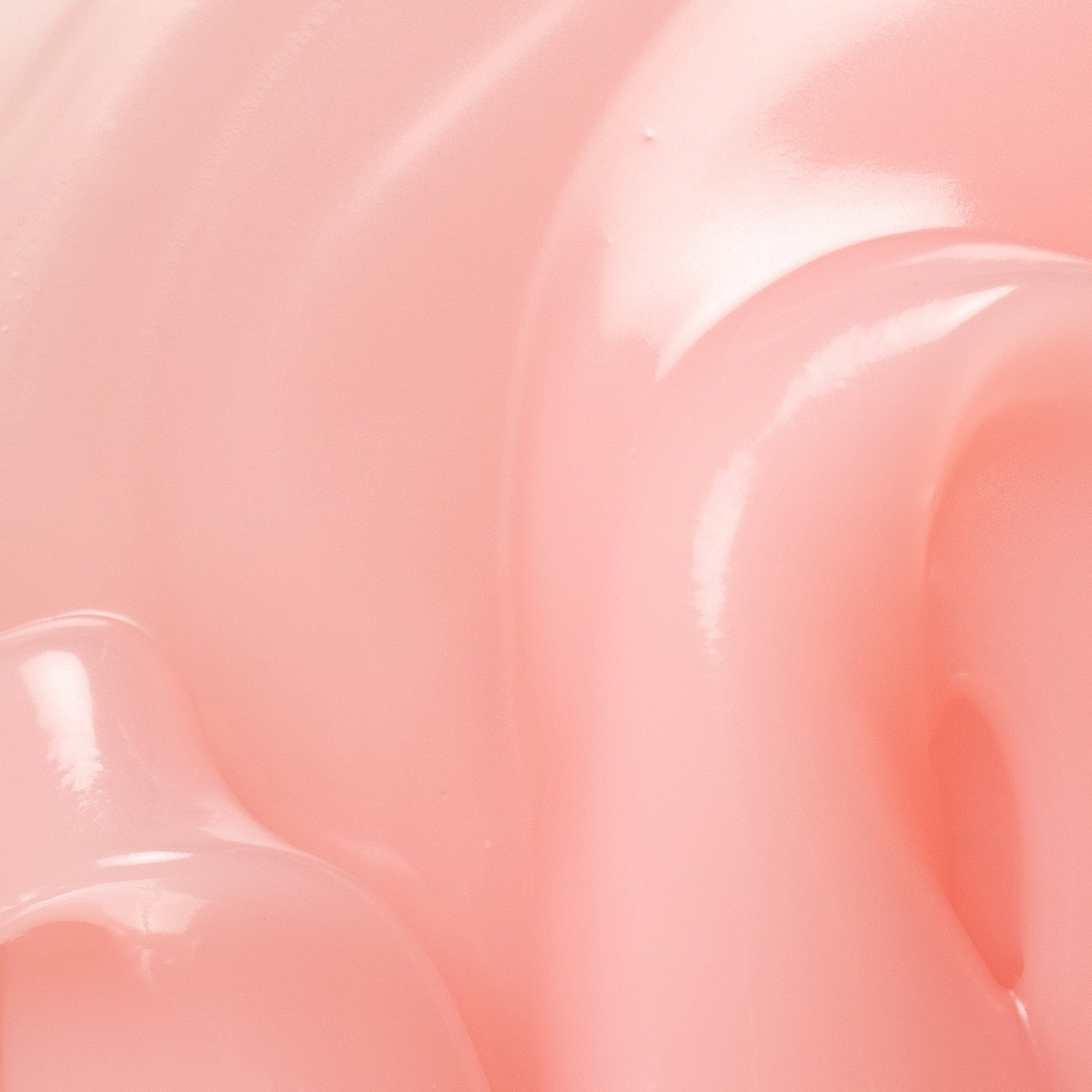 Smooth pink cream with a glossy texture.