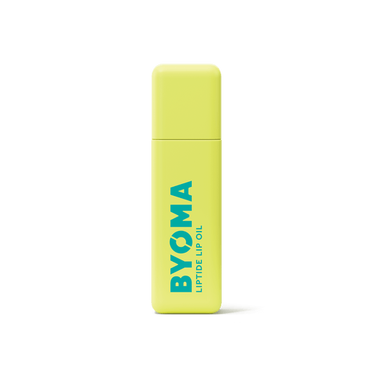 A BYOMA Liptide Lip Oil bottle.