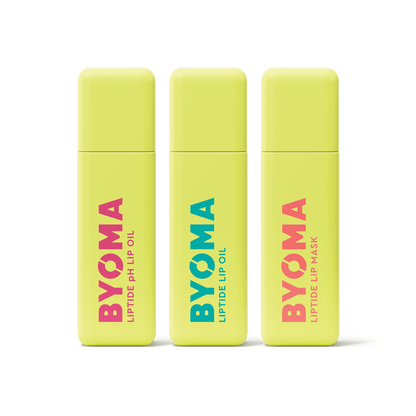 Three BYOMA Liptide lip treatments – pH Lip Oil, Lip Oil, and Lip Mask in yellow tubes against transparent background