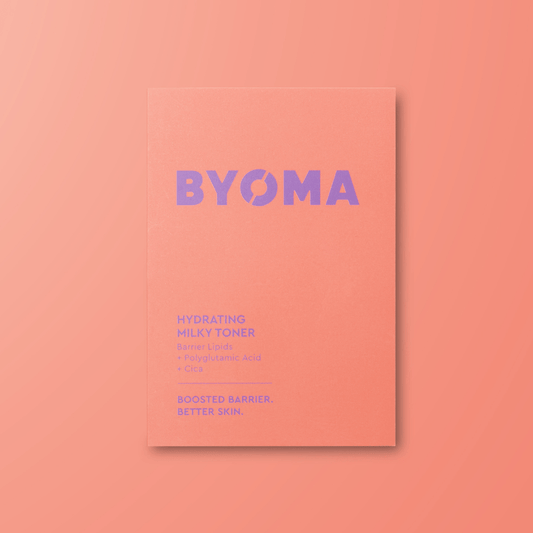 BYOMA hydrating milky toner sample on a peach background